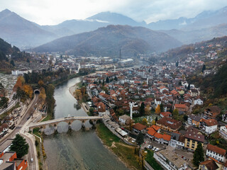 Aerial drone view of Konjic city, bridge, and river Neretva. Bosnia and Herzegovina.