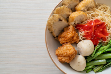 egg noodles with fish balls and shrimp balls in pink sauce, Yen Ta Four or Yen Ta Fo