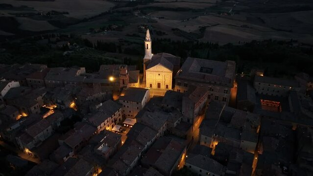 Night evening aerial view of Medieval Pienza Town in Tuscany, Siena Province, Italy, scenic Landscape of Historic Village in Southern Tuscany.