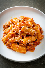 Rigatoni pasta bolognese with cheese