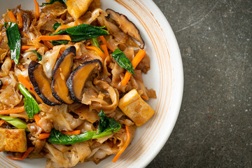 stir-fried noodles with tofu and vegetables