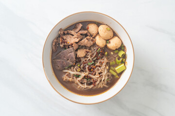 Thai noodle with pork, stewed pork, meatball and pork liver in blood soup
