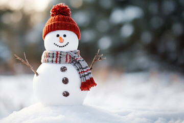 Snowman with scarf and hat in snowy park, winter christmas landscape