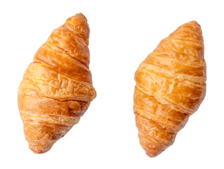Top view of two separated fresh croissants isolated on white background with clipping path in png file format