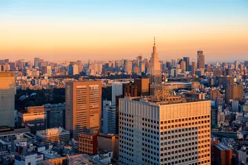 Papier Peint photo Tokyo Skyscrapers towering over the cityscape of Nishi-Shinjuku, Tokyo, Japan at sunset
