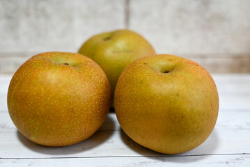 pears on a wooden table