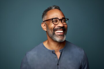 Portrait of a happy african american man in eyeglasses - obrazy, fototapety, plakaty