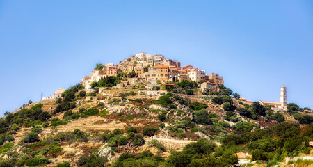 Fototapeta na wymiar View of the Beautiful Medieval Village of Sant’Antonio on a Hilltop in the Balagne Region on Corsica