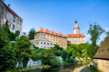 Fototapeta na wymiar The Vltava River in Beautiful Cesky Krumlov in the Czech Republic, with the Castle Overlooking the River and the City