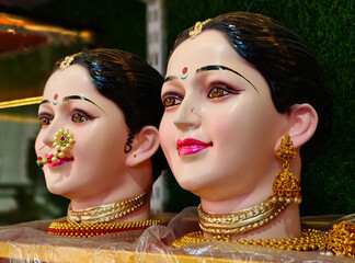 14 September 2023, Pune, Maharashtra, India, Faces of Goddess Gauri mother of ganesha For sale And...