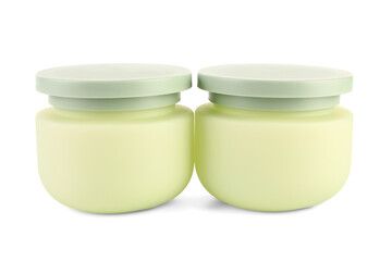 Cosmetic jars isolated on white background