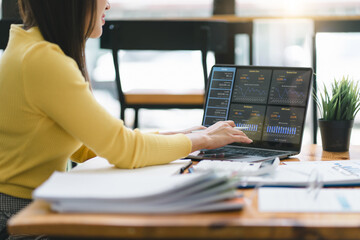 Advisor financial business analytics woman analyzing data charts, graphs, and a dashboard on laptop screen. Data analysis concept