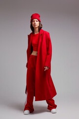 Fashion asian female model in red coat. - 651440545
