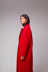 Fashion asian female model in red coat. - 651440562