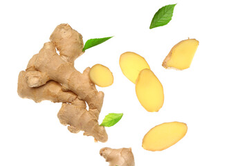 Flying fresh ginger roots and leaves on white background
