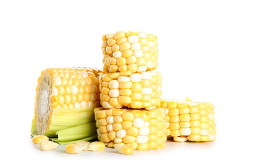 Cut fresh corn cob and seeds on white background