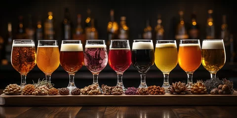 Gordijnen Glasses with different sorts of craft beer on wooden bar © Влада Яковенко