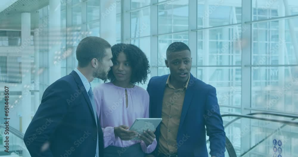 Poster animation of map and computer language over diverse coworkers discussing and pointing in office