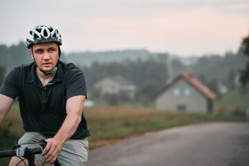 Rider in action at Graveling bike. A man rides a bicycle. Outdoor activity.