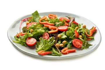 Plate with fresh vegetable salad on white background