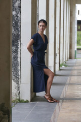 Fototapeta na wymiar Fashion outdoor portrait of stylish woman in blue linen dress, spring-summer fashion trend