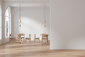White restaurant interior with seats and table near window, mock up partition
