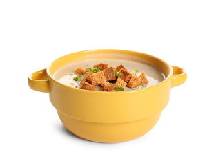 Pot of tasty cream soup with croutons on white background