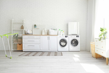 Interior of laundry room with washing machines