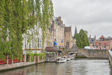 Scenery with water canal in Bruges, "Venice of the North", cityscape of Flanders, Belgium.