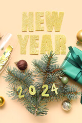 Fir branches with gift box, Christmas balls and text NEW YEAR 2024 on beige background