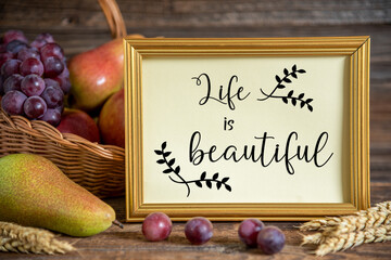 Fall Decoration with Fruits and Text Life Is Beautiful