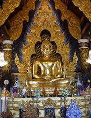Golden Buddha statue in a northern temple.