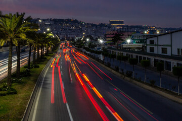 Obraz premium Highway in Algiers, Alger, Algeria by night. Long exposure with rays of light coming from the vehicles.