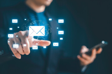 E-mail with notification alert concept. internet technology. Businessman using computer laptop with virtual white newsletter for electronic.