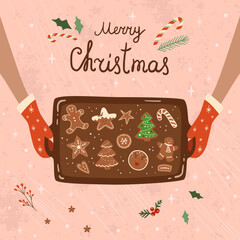 Baking tray with Christmas cookies card. Hands holding oven tray with different types of gingerbreads. Cute baked Christmas cookies. Hand drawn vector Illustration. Top view tasty winter postcard. - 651492723