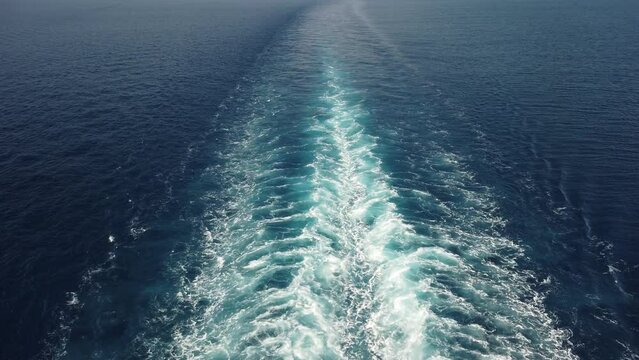 The wake left by a cruise ship as seen from the upper deck, in the Mediterranean