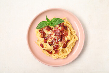 Plate with tasty pasta carbonara on white background