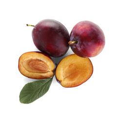 Fresh ripe plums and leaf on white background