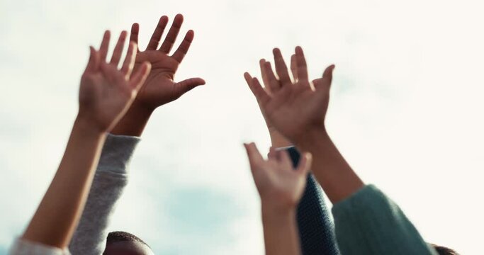 Friends, hands and people reaching on sky background in support of community, help or volunteering. Recycling, teamwork and volunteer group in solidarity for environment, change or mission motivation