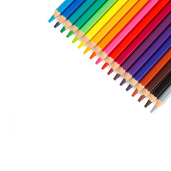 set of multi-colored pencils on a white background