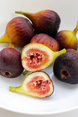 Fresh figs on white background.