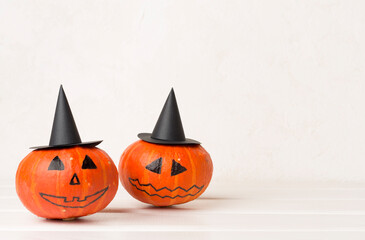Halloween composition with jack o lanter decor on wooden table