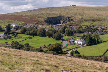 Merrivale, Dartmoor, Devon, England, UK. 3 September 2023. An overview of the hamlet of Merridale with its pub and disused granite quarry on the B3357 road across Dartmoor.