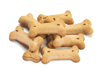 Dry dog food in the form of bones on a white background. Top view.