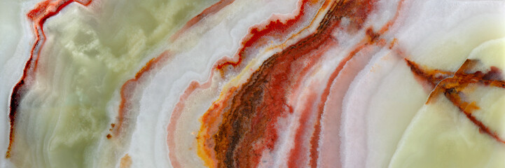 Onyx. Texture of semi-precious stone in green, brown, white colors. Variety of agate