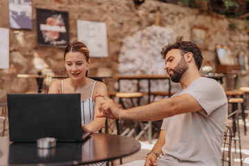 A group of professionals strategizing and discussing trends in the e-commerce industry at a cafe bar.