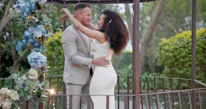 Wedding, first dance and happy couple in garden with love, celebration and excited for future together. Gazebo, man and woman at outdoor marriage reception with flowers, music and happiness at party.