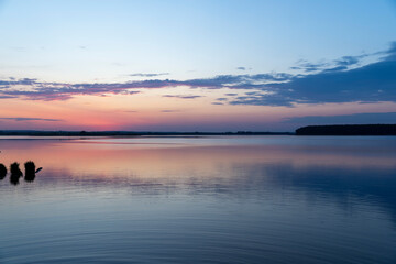 multicolored sky during sunset on the lake