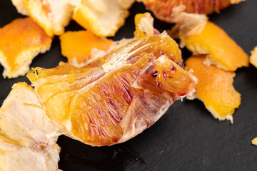 sliced orange with yellow-red juicy flesh
