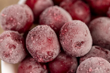 red cherry covered with a thin layer of ice